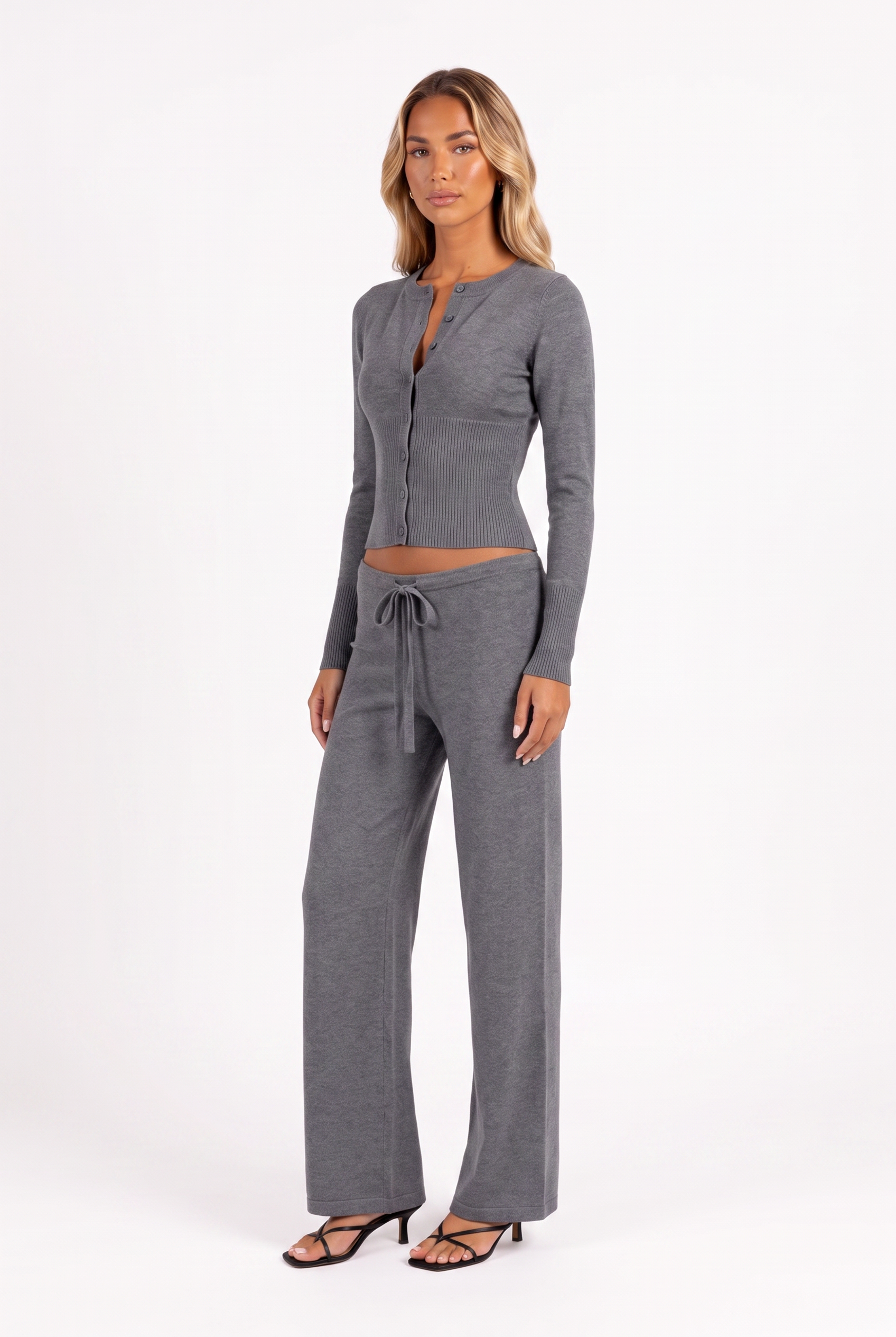 Dark grey knit cardigan and low-rise drawstring trouser set — three-quarter